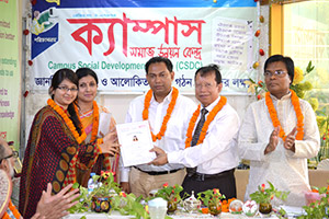 Vice-Chancellor of BUFT, Professor Dr. Syed Masud Husain and Founder Chairman of Debate for Democracy Hassan Ahamed Chowdhury Kiron, is giving Certificates to the Trainees of Free Computer Training (Batch 126+127); Dr. M Helal is presiding over. (2014)